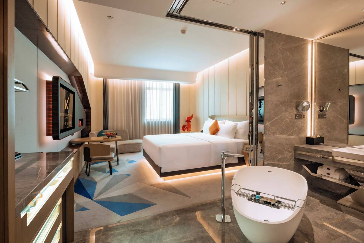 Ropa de cama de alta calidad, cubrecamas y minibar