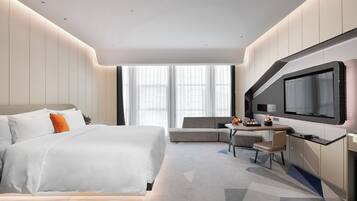 Habitación Elite | Ropa de cama de alta calidad, edredones de plumas, minibar y caja fuerte