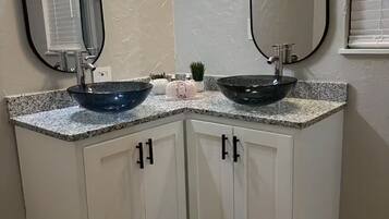 Shower, towels, soap, toilet paper