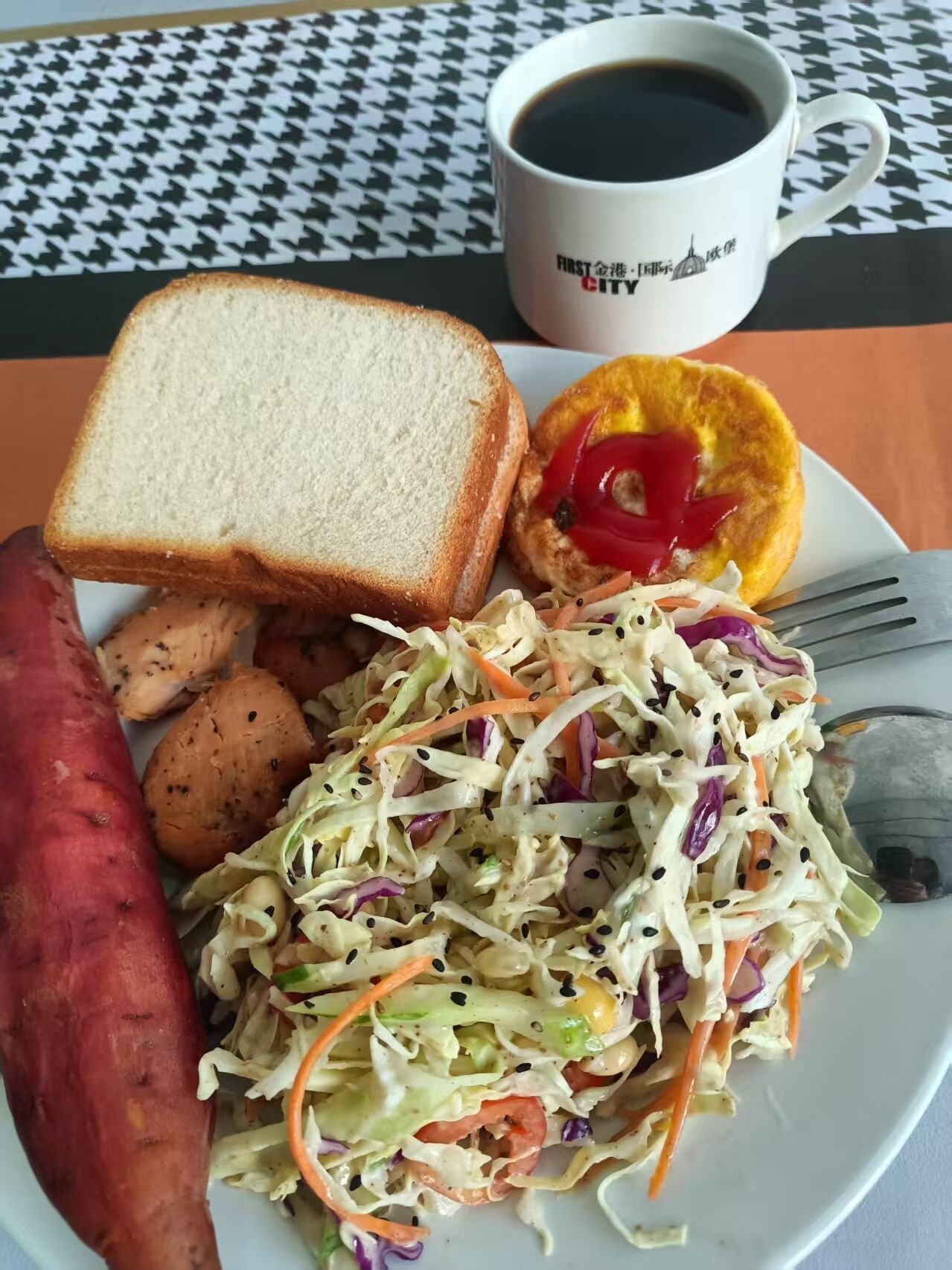 A plate with coleslaw, a slice of bread, a sausage, and a half of a red bell pepper. There is also a cup of coffee.