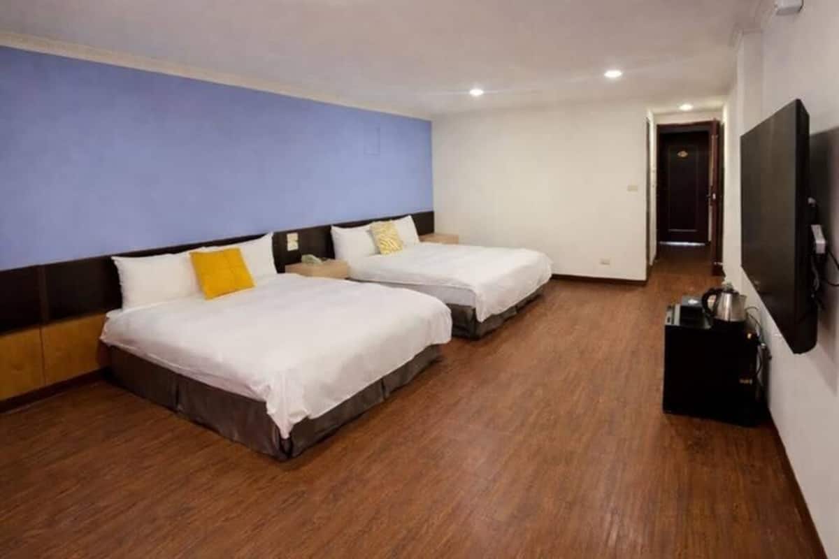 Economy Quadruple Room, No Windows | Down comforters, blackout drapes, free WiFi, bed sheets