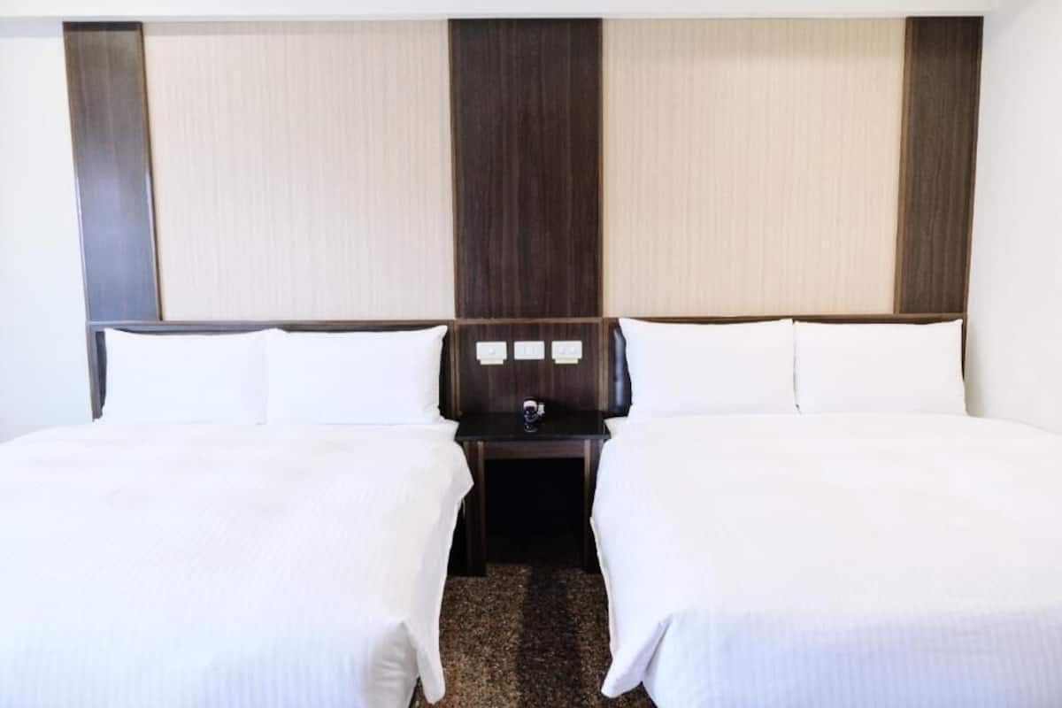 Standard Quadruple Room | Desk, blackout drapes, free WiFi, bed sheets