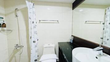 Standard Double Room, City View | Bathroom | Hair dryer, slippers, towels, shampoo