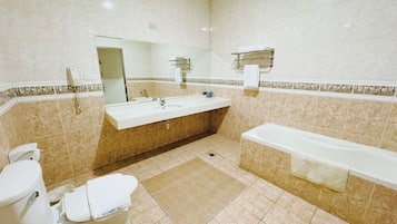 Hair dryer, slippers, towels, shampoo