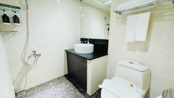 Standard Double Room, City View | Bathroom | Hair dryer, slippers, towels, shampoo