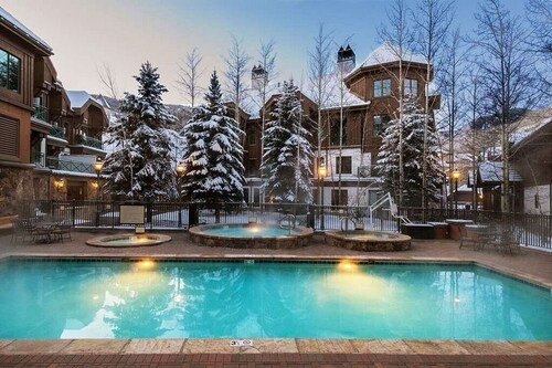 An old-world alpine chalet with emphasis on modern luxury and sophistication.