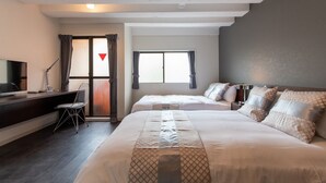 A hotel room with two beds, a desk with a computer, a chair, and a TV. - 2min walk from Nakano Station 1min walk to Nakano Broadway MAX4 Guests(2) (中野区中野)