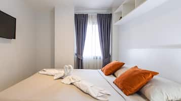 Apartment, Balcony | In-room safe, blackout drapes, iron/ironing board, free WiFi