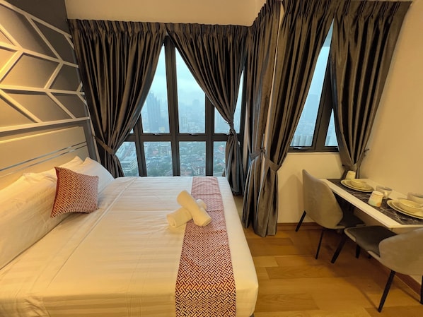 Deluxe Studio, City View | Desk, laptop workspace, iron/ironing board, free WiFi