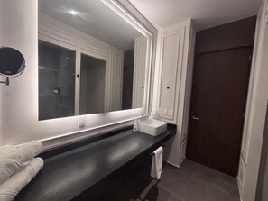 Shower, towels, soap, shampoo