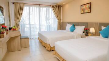 Deluxe Triple Room, Balcony, City View | In-room safe, blackout curtains, free WiFi, wheelchair access
