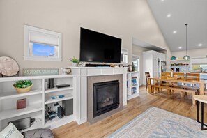 Smart TV, fireplace, books