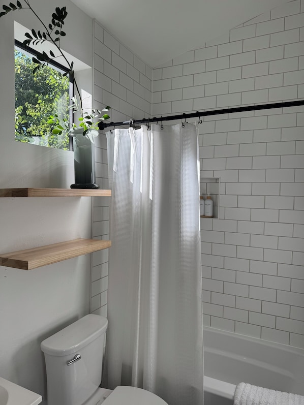 Hair dryer, towels, soap, toilet paper