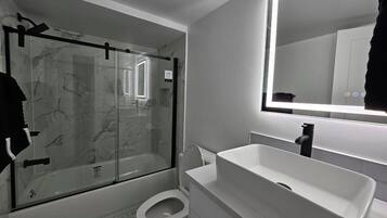 Hair dryer, towels, soap, toilet paper