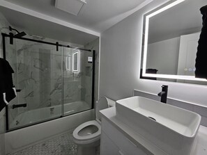 Hair dryer, towels, soap, toilet paper