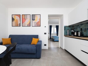 Luxury Apartment, Sea View | Living area | 46-inch flat-screen TV with digital channels, Netflix