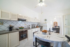 Standard House, Multiple Bedrooms (Villa Calò 2 200 meters from Sea) | Private kitchen | Fridge, oven, stovetop, coffee/tea maker - Villa Calò (Maruggio)