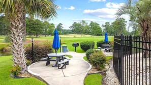 Outdoor dining - 5 blocks to beach, family-pet friendly golf condo
near pools and top attractions (Myrtle Beach)