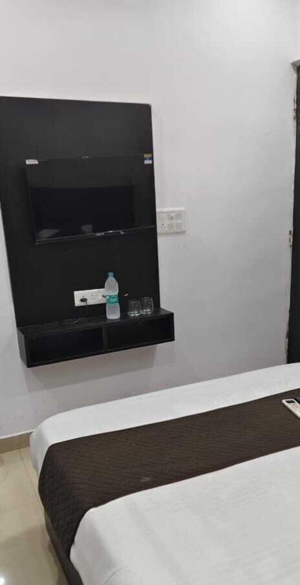 غرفة ديلوكس | أسرّة قابلة للطي وواي فاي مجانًا وملاءات أسرّة