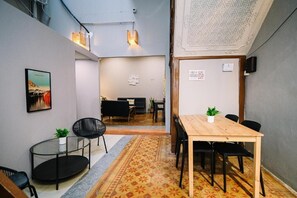 Living area - Swing & Pillows at 87 Chulia St (George Town)