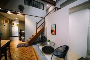 Living area - Swing & Pillows at 87 Chulia St (George Town)