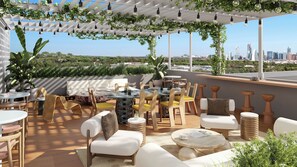 Outdoor dining - 4 King Suites | Resort-Style Amenites w/ Pool, Bar, Dining, Terrace | The Code (Austin)