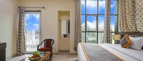 Habitación Deluxe | Muebles diferentes, wifi gratis y ropa de cama