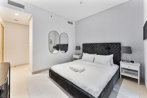 2 chambres, coffre-fort, fer et planche à repasser