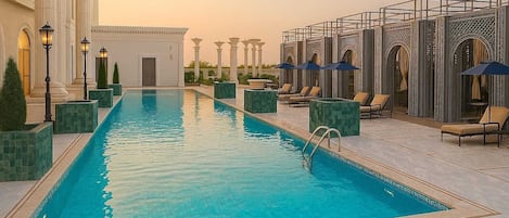 15 indoor pools, open 8:00 AM to 8:00 PM, free cabanas, pool umbrellas
