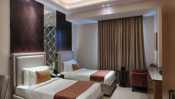 Superior Twin Room, Pool View | In-room safe, desk, laptop workspace, blackout curtains