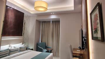 Superior Double Room, Pool View | In-room safe, desk, laptop workspace, blackout drapes