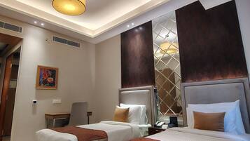 Superior Twin Room, Pool View | In-room safe, desk, laptop workspace, blackout curtains
