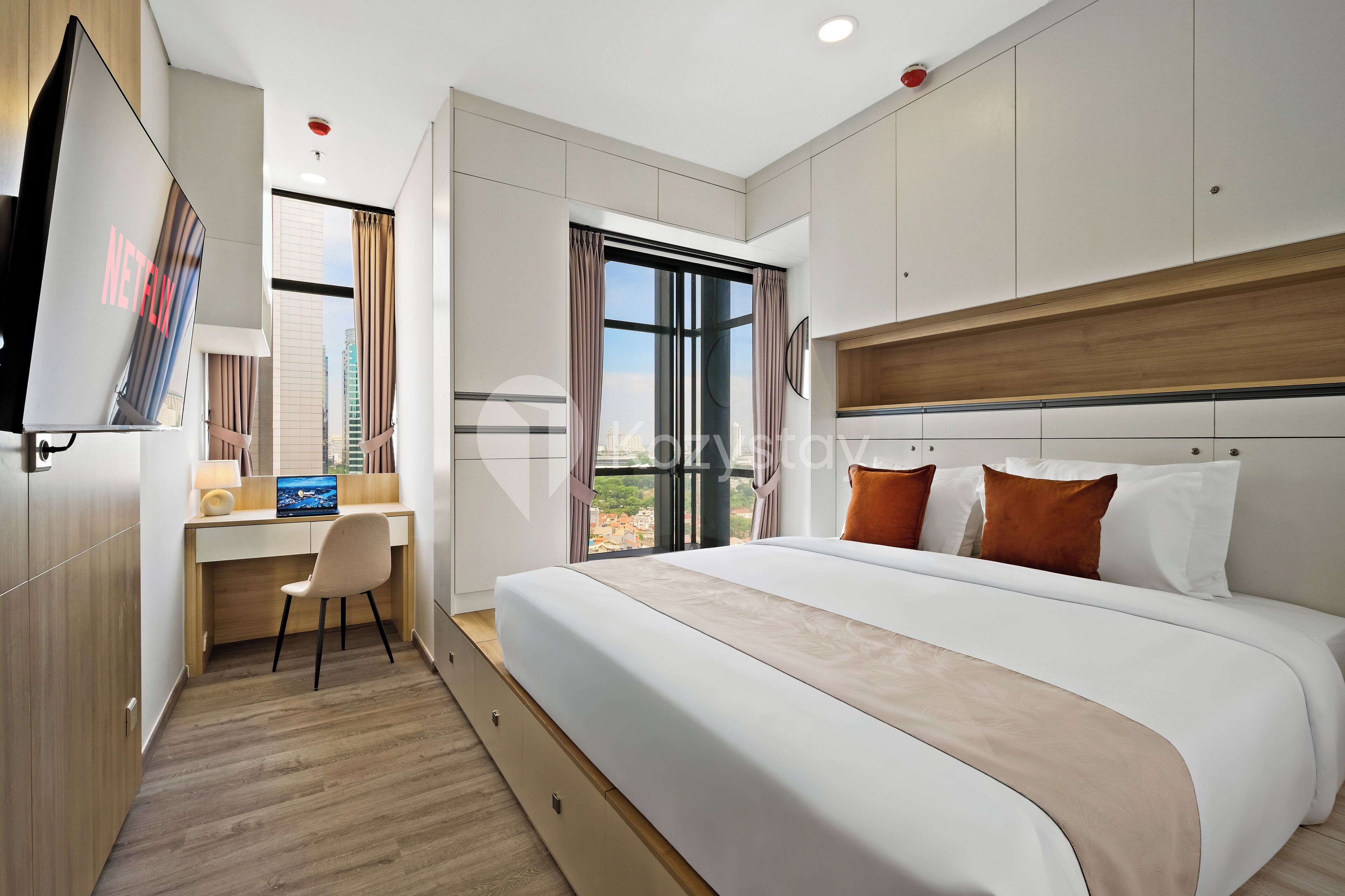 Apartment, 1 Bedroom, City View | Desk, laptop workspace, iron/ironing board, free WiFi