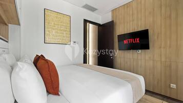 Huoneisto, 1 makuuhuone, kaupunkinäköala | Työpöytä, kannettavalle tietokoneelle sopiva työtila