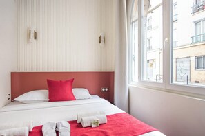 2 slaapkamers, een strijkplank/strijkijzer, wifi, beddengoed
