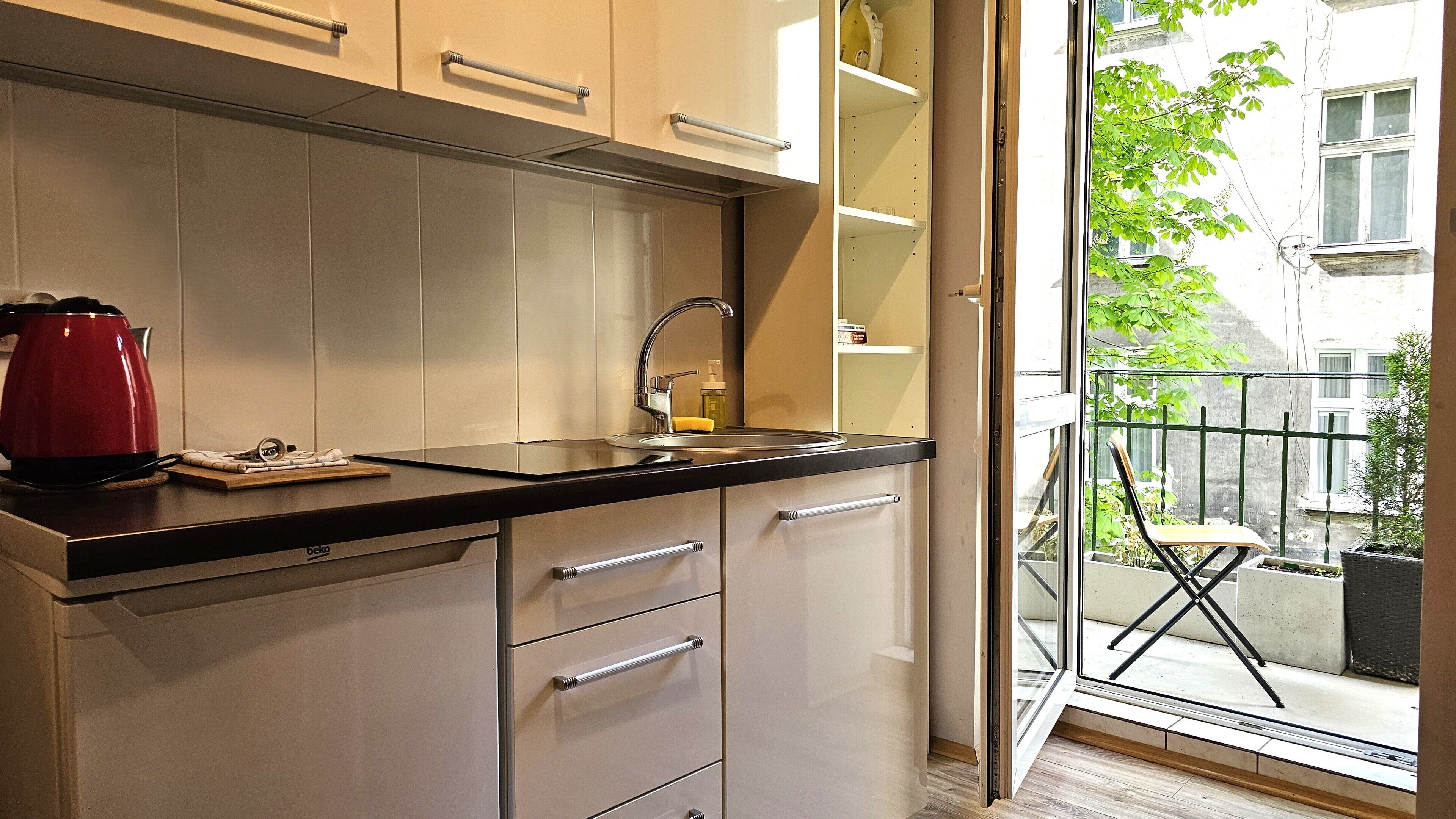 Fridge, microwave, stovetop, coffee/tea maker