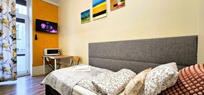 1 slaapkamer, een strijkplank/strijkijzer, gratis wifi, beddengoed