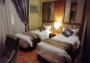 Apartment, 3 Bedrooms | Blackout drapes, soundproofing, iron/ironing board