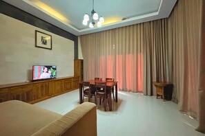 فيلا ديلوكس - غرفة نوم واحدة - منظر للحديقة | غرفة المعيشة