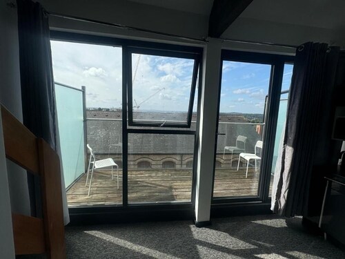 Kick Back Relax Stylish Space With Balcony