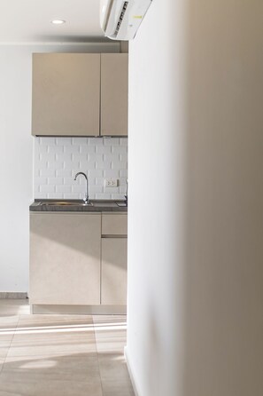 Apartamento, 1 quarto, sacada, vista para a montanha | Cozinha americana privada