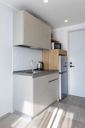 Apartamento, 1 quarto, sacada, vista para a montanha | Cozinha americana privada