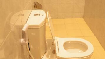 Shower, slippers, towels, soap