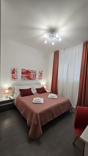 1 غرفة نوم ومكواة/لوح كي وواي فاي وملاءات أسرّة