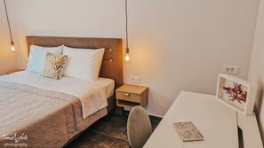 Deluxe appartement, uitzicht op zee | Een kluis op de kamer, verduisterende gordijnen