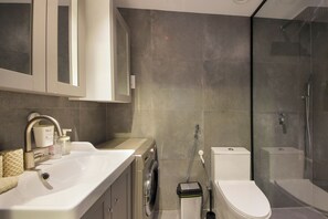 Comfort Apartment, 1 Bedroom, Kitchen, Lakeside | Bathroom - Silk Valley-Luxury 1B near Serene Lakes (Dubai)