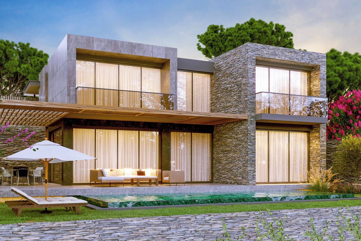 A modern two-story house with a stone facade, large windows, and a pool area with lounge chairs.