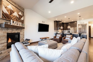 Smart TV, fireplace, foosball