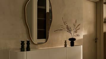 Hydromassage showerhead, designer toiletries, hair dryer, bathrobes