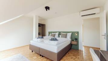 Zimmersafe, VerdunkelungsvorhĂ€nge, BĂŒgeleisen/BĂŒgelbrett